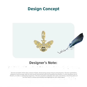 Detailed view of s925 silver honeybee pendant with gold plating and sparkling zircon stones