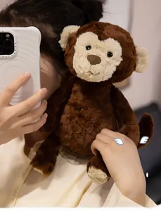 Close-up of a soft plush monkey doll showing high-elasticity fur and realistic facial details