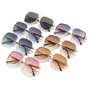 Classic aviator sunglasses with gradient lenses and gold frames in various colors