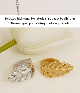Detail of gold and silver leaf rings with high-quality PVD plating and anti-allergic finish