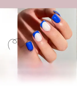 Detail of royal blue and white French style press-on nails in short square shape
