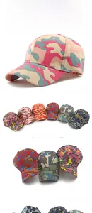 Detail of multi-color camouflage twill cotton baseball cap with structured crown