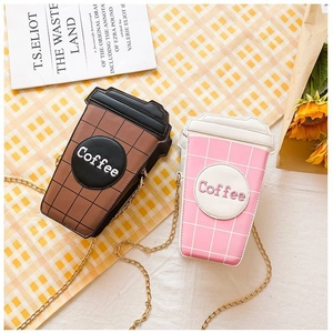 Detail view of coffee cup shaped chain bags in brown and pink with quilted pattern