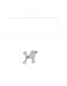 Detailed view of pearl and rhinestone poodle brooch with dimensions 6.5cm by 6cm