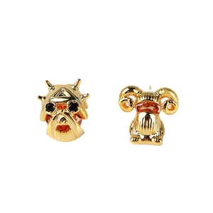 Boucles d'oreilles dorées avec motifs fantôme et bélier sertis de pierres oranges