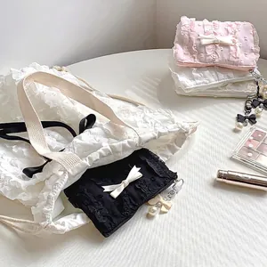 Set di borse cosmetiche in pizzo con grande borsa bianca e astucci per il trucco