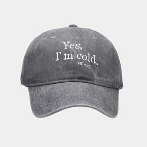 Close-up of vintage washed gray cotton baseball cap with Yes, I'm cold. letter print