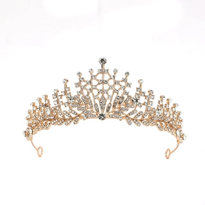Macro detail of luxury baroque gold bridal crown featuring crystal rhinestones and fixing loops