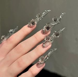 Gothic stiletto press-on nails with silver metal roses and thorny vine elements