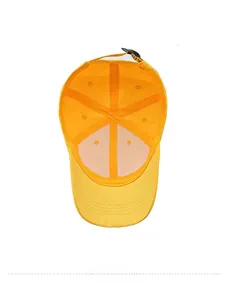 Detail view of yellow baseball cap interior with six-panel structure and adjustable strap