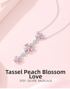 Detail of S925 silver tassel necklace with pink plum blossom and teardrop zircon
