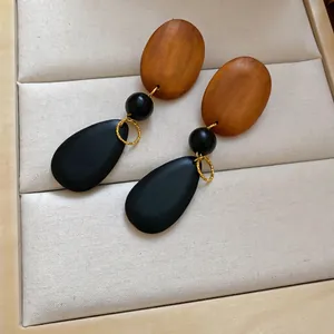 Vintage wooden drop earrings with oval wood studs and black teardrop pendants for women