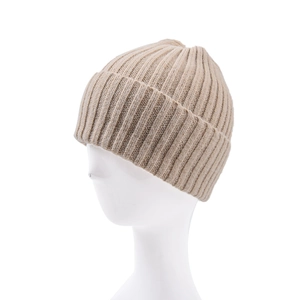 Detailed view of beige ribbed knit beanie with thick fold-over cuff on display model