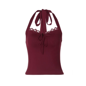 Detailed close-up of wine red halter top with delicate lace trim and knit texture