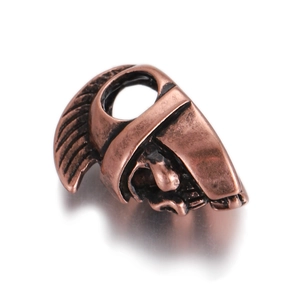 Macro detail of 18K gold-plated Spartan helmet bead with intricate bronze finish and zircon teeth