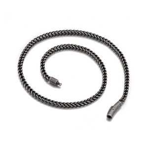 Vintage antique silver stainless steel dragon bone chain necklace for men in studio setting
