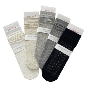 Five pack of women's hollow knit slouch socks in assorted neutral cotton colors