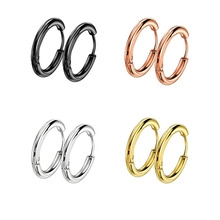 Detail view of round hoop earrings in black, rose gold, silver, and gold finishes