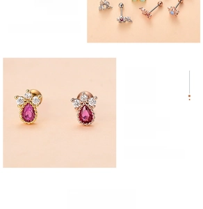Detail of red teardrop zircon and flower cluster earrings with secure screw back posts