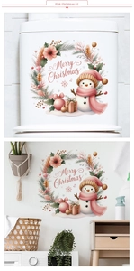 Détail des stickers de Noël roses pour toilettes avec bonhomme de neige et texte Joyeux Noël