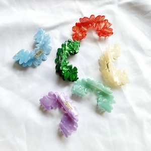 Set of 6 colorful acetate wavy flower hair claws for French style updo hairstyling