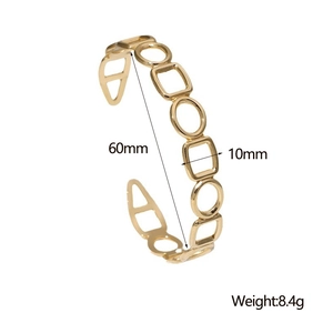 Detailed view of gold geometric bangle showing 60mm diameter and 10mm width