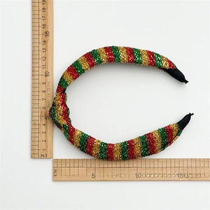 Christmas headband with red, green and gold glitter stripes and knot detail
