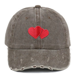 Vintage washed charcoal baseball cap with red heart embroidery and distressed brim edge
