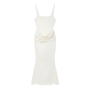 Detail of white maxi dress showing waist pleats and fishtail hem on a plain background
