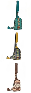 Detailed stack of three bohemian crossbody bags in turquoise, blue, and brown canvas material