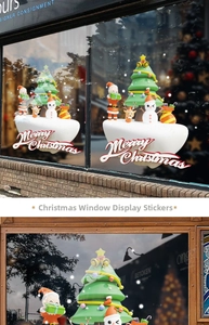 Detailed view of 3D Merry Christmas window decals with Santa, reindeer and snowman designs