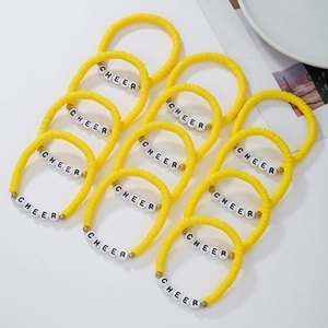 Set of 12 bright yellow polymer clay cheer friendship bracelets with letter beads