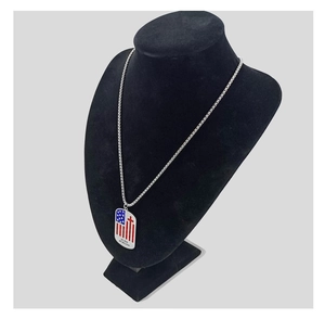 Detail of dog tag necklace with American flag and My Son My Soldier text engraving
