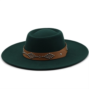 Dark green wool fedora hat with wide brim and studded brown leather band for outdoors