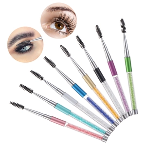 Detailed set of spiral eyelash brushes with sparkling rhinestone handles in various colors