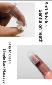 Detail of soft silicone pet finger toothbrush showing flexible bristles and massage nubs