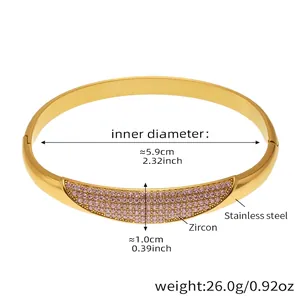 Detail view of 18k gold plated stainless steel bangle with pink zircon inlay and dimensions