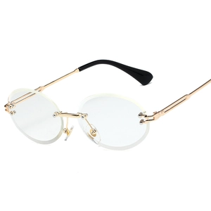 Retro rimless round sunglasses with gold metal temples and gradient lenses for women