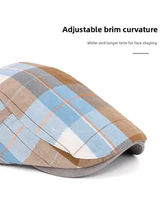 Close-up of colorful plaid beret featuring a foldable wide brim and cotton blend texture
