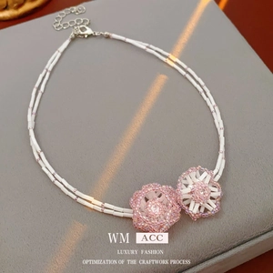 Double-layered bamboo bead necklace with pink and white floral pendants for women