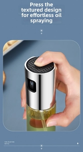 Detail of the non-slip press pump head and transparent glass of the 260ml oil sprayer bottle