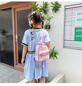 Pink sequin kids backpack featuring cute bunny ears and a stylish transparent front pocket