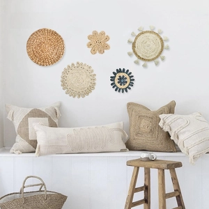 Set of 5 woven wall baskets with sunburst and floral patterns for boho home decor