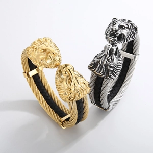 Men's stainless steel lion head open bangles in gold and silver with woven steel texture