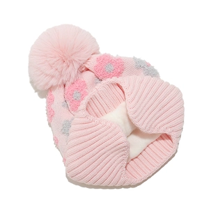 Detail view of pink knit hat with floral 3D patterns and warm fleece lining for kids