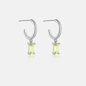 Detail of S925 sterling silver earrings featuring rectangular yellow stone charms