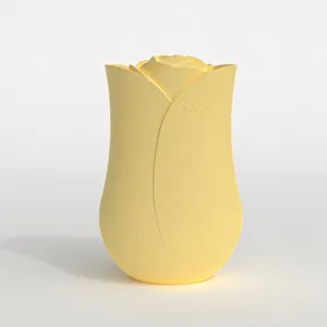 Macro shot of rose-shaped facial ice roller mold in bright yellow with petal texture