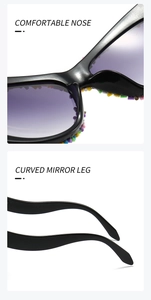Close-up of cat eye sunglasses featuring comfortable nose pads and curved temples with beads