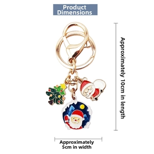 Detail shot showing Santa and Christmas tree enamel charms with 10cm length dimensions