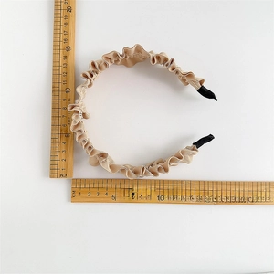 French style beige pleated wavy headband with satin texture for elegant hair styling